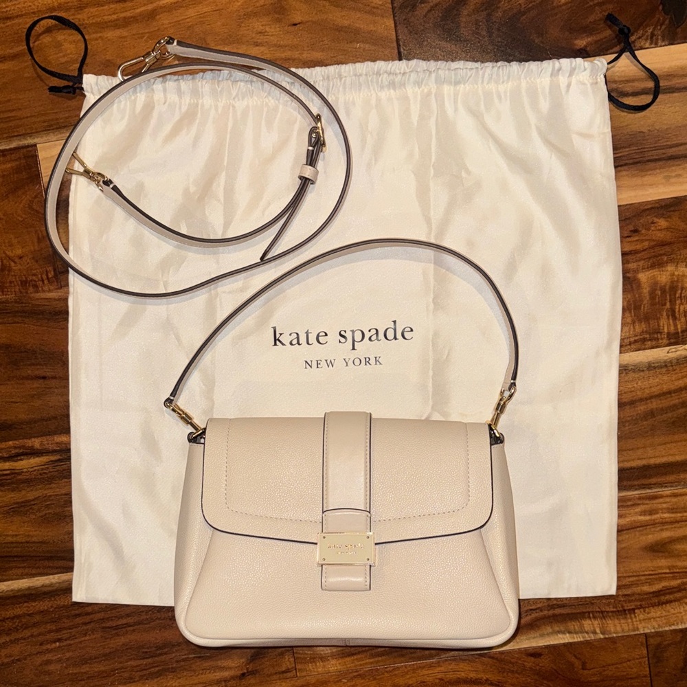 Kate Spade ivory shoulder bag with long strap included